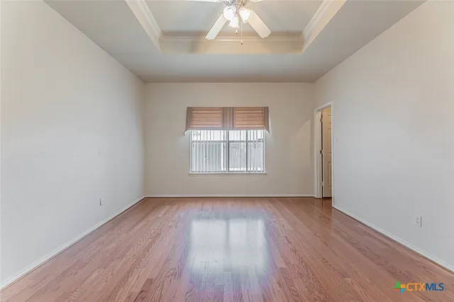 a bathroom with a tub sink and a mirror