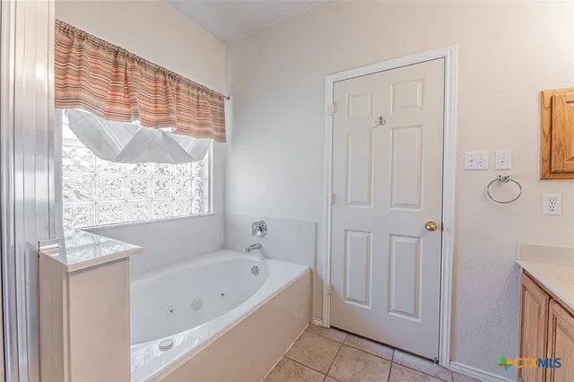 a bathroom with a sink toilet and vanity