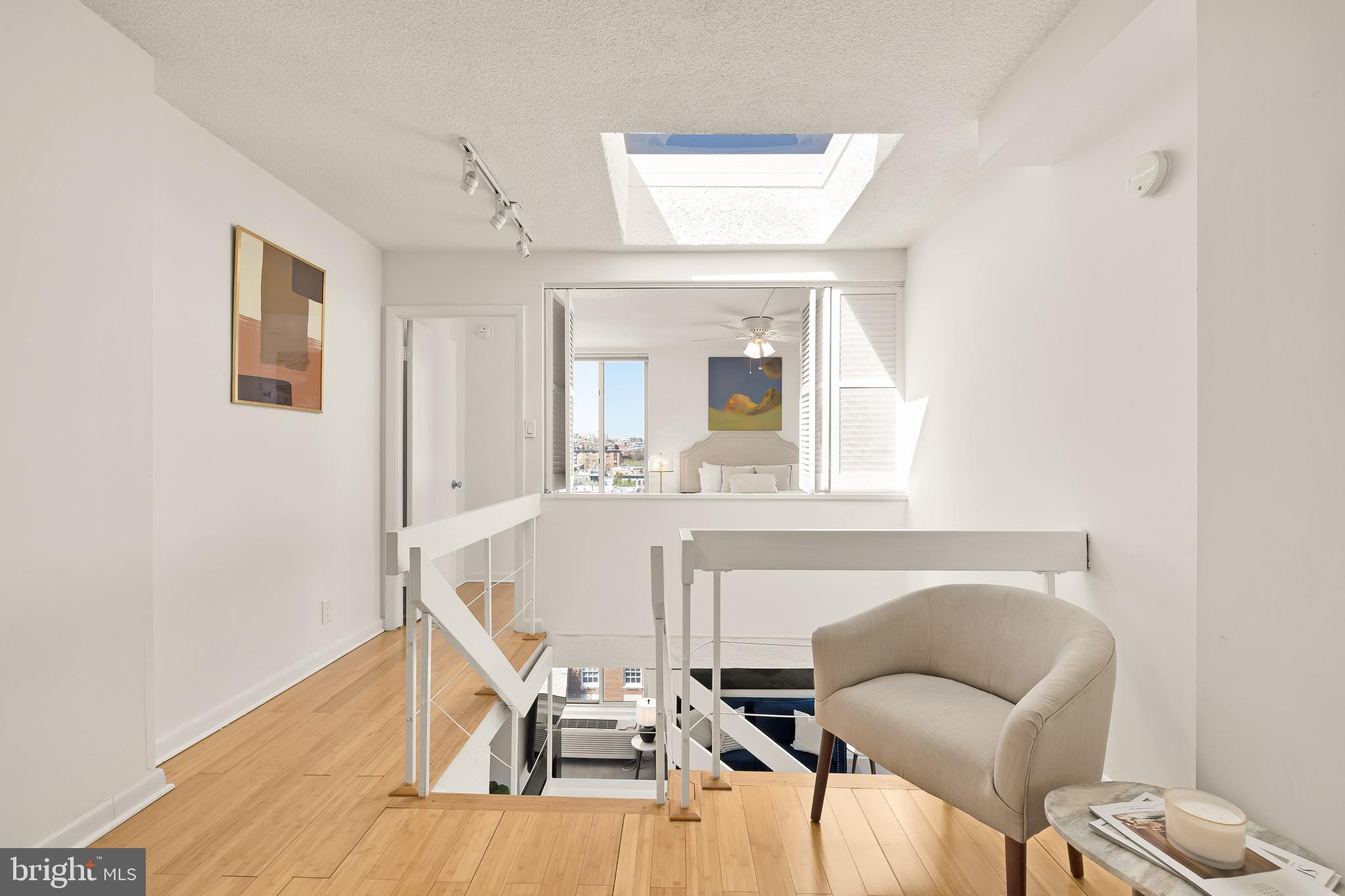 1800 R Street Northwest, Unit 807 Washington, DC 20009 - Photo 15 of 23 a view of a livingroom with furniture and staircase