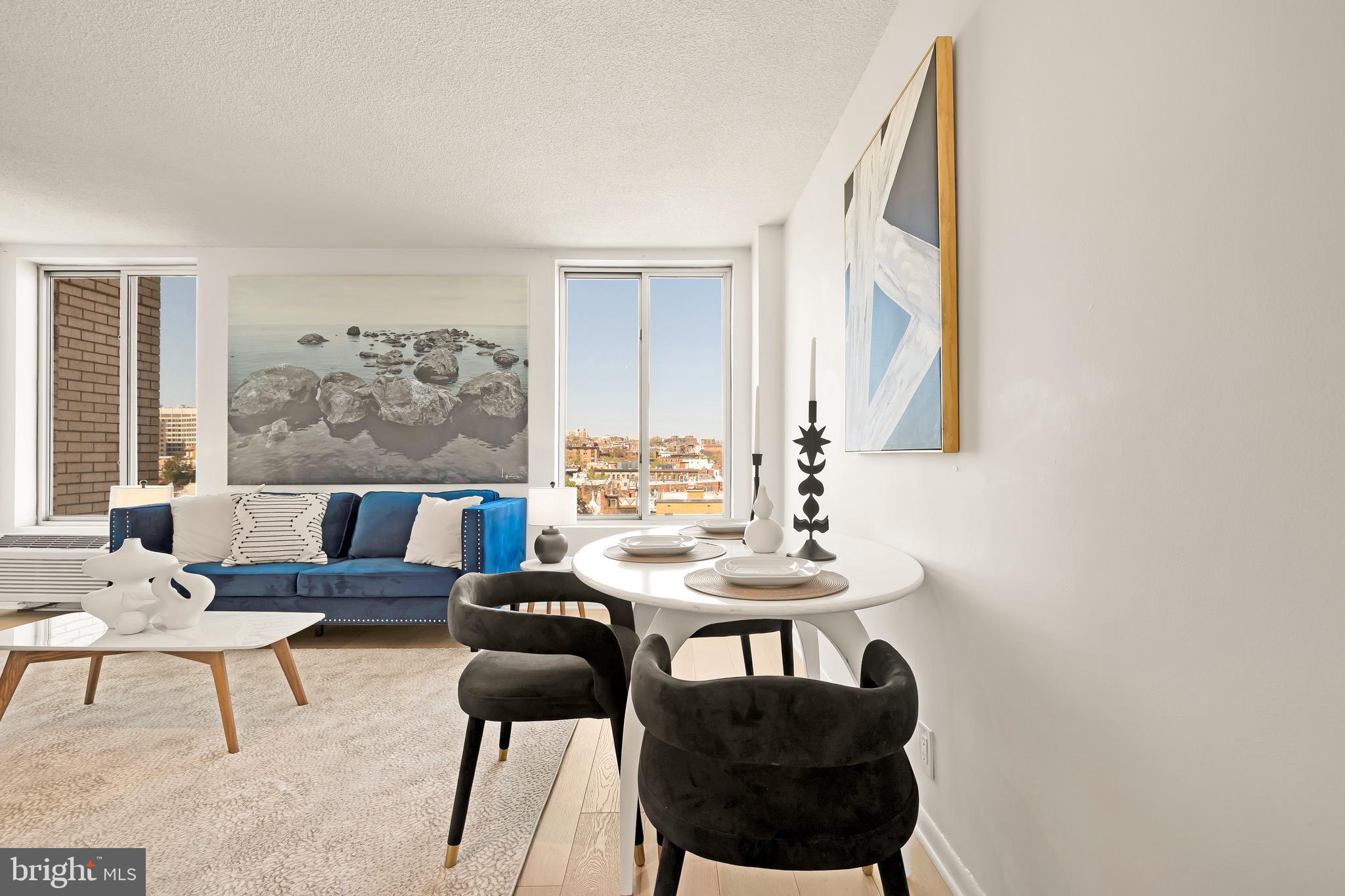 1800 R Street Northwest, Unit 807 Washington, DC 20009 - Photo 4 of 23 a living room with furniture and a table