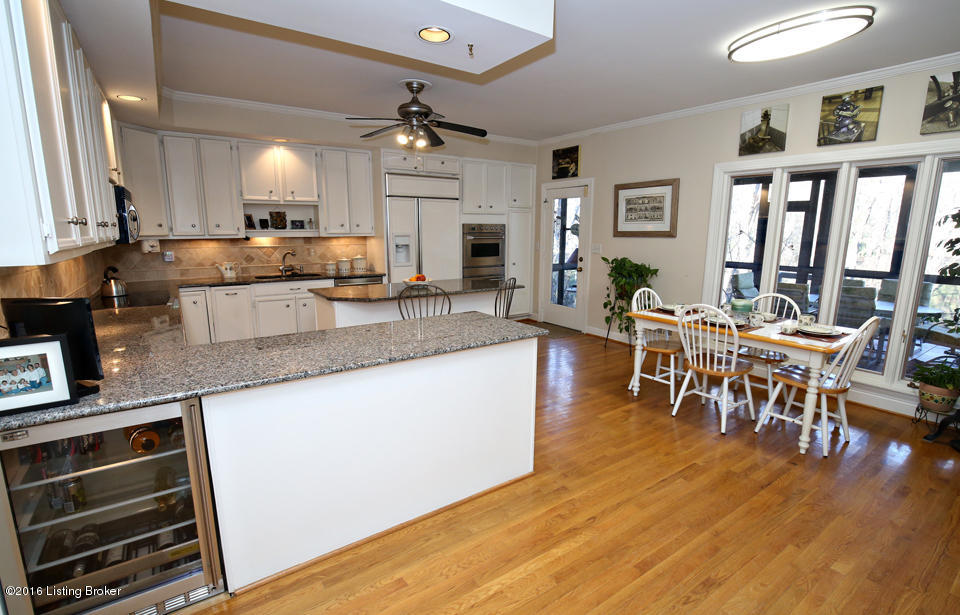 1005 Devon Road Goshen, KY 40026 - Photo 6 of 55 Granite counters & island. Direct access to the screened porch. Enjoy alfresco dining!
