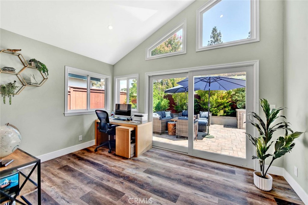 14762 Bridgeport Road Tustin, CA 92780 - Photo 12 of 29 a living room with furniture a potted plant and a large window