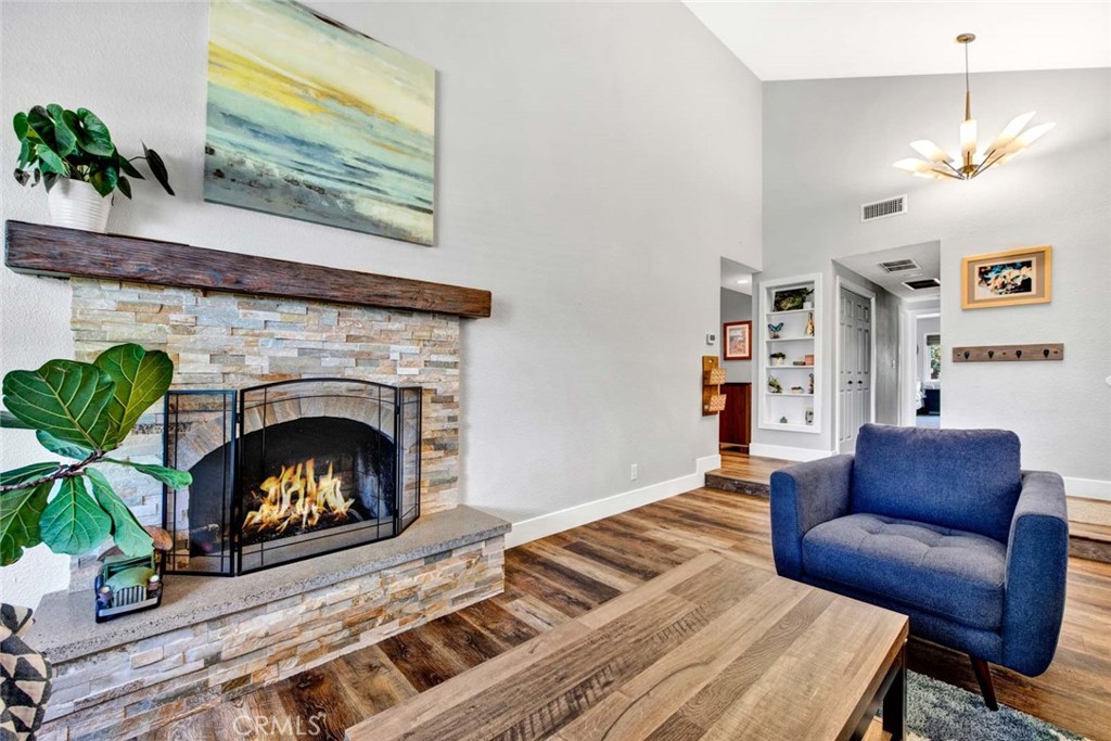 14762 Bridgeport Road Tustin, CA 92780 - Photo 5 of 29 a living room with furniture and a fireplace