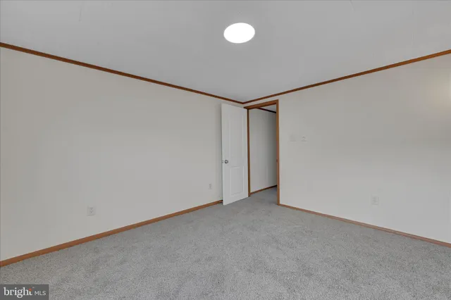 a bathroom with a toilet and a tub