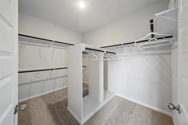 a view of a walk in closet