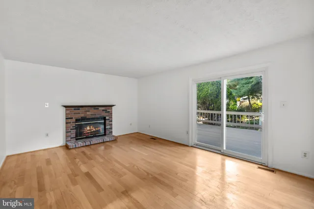 a bathroom with a sink vanity and a toilet