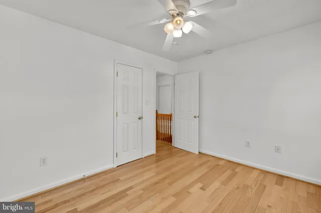 a view of a house with wooden deck