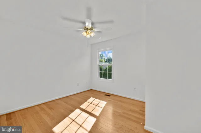 a view of balcony with deck and wooden floor