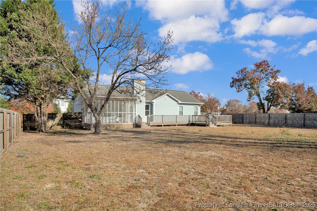 101 2 Hours Court Raeford, NC 28376 - Photo 29 of 30 a big house with palm trees in front of it
