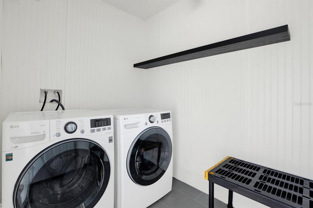 Undisclosed Address Tampa, FL 33607 - Photo 23 of 31 a utility room with dryer and washer