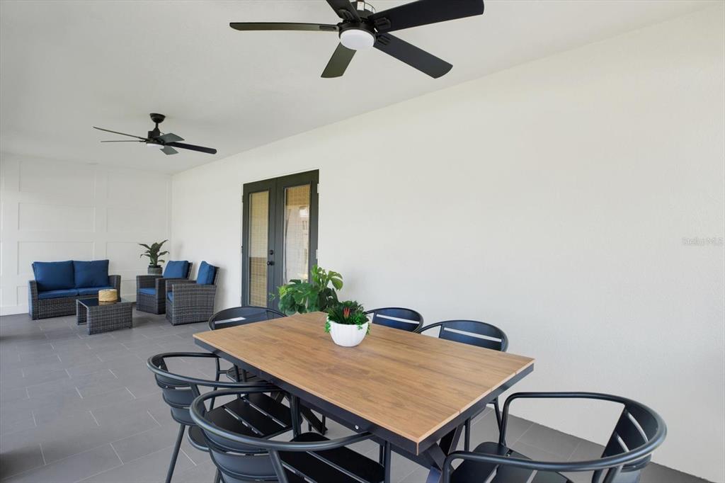 Undisclosed Address Tampa, FL 33607 - Photo 25 of 31 a view of a dining room with furniture