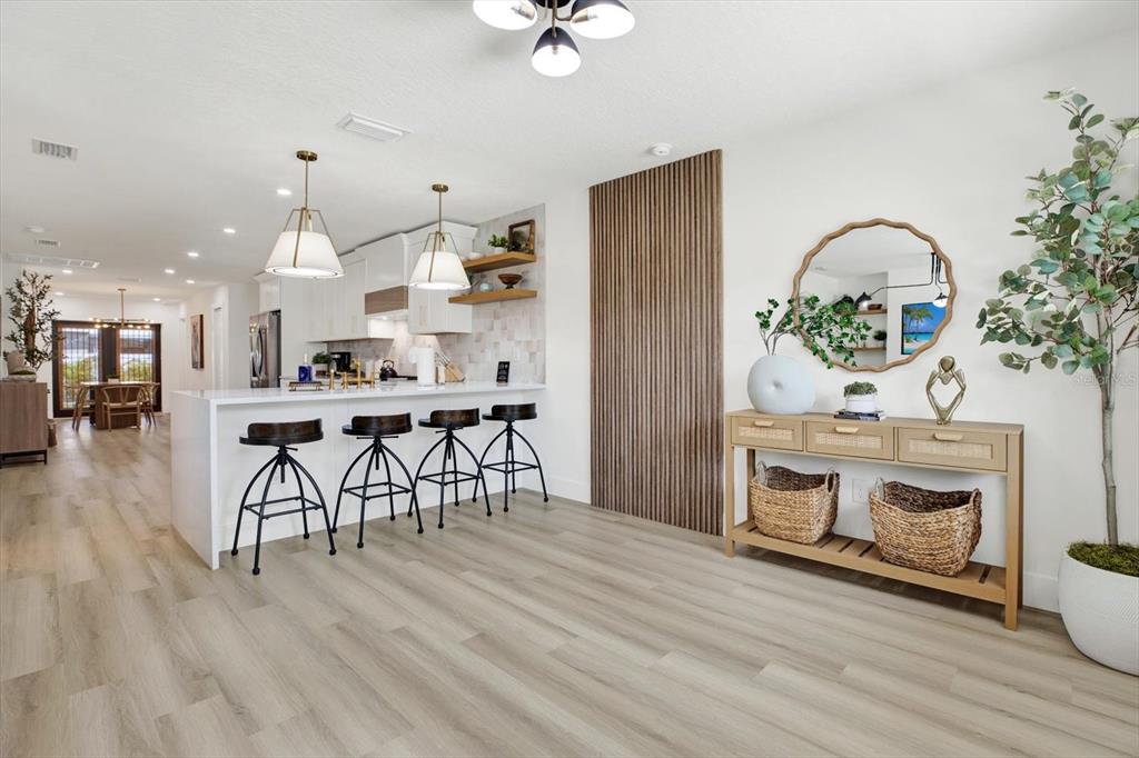 Undisclosed Address Tampa, FL 33607 - Photo 4 of 31 a living room with furniture and wooden floor