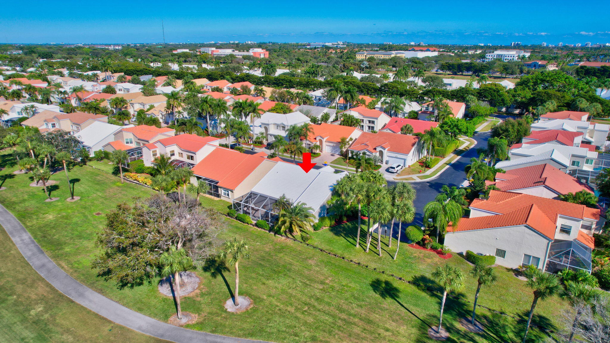 17357 Balboa Point Way Boca Raton, FL 33487 - Photo 54 of 69 an aerial view of residential houses with outdoor space and trees