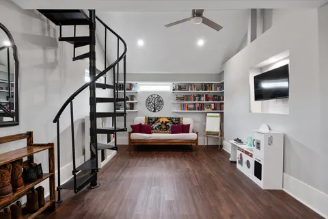 a view of a balcony with wooden floor