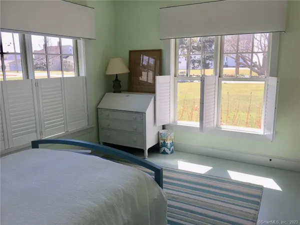 a room with a bed and a table
