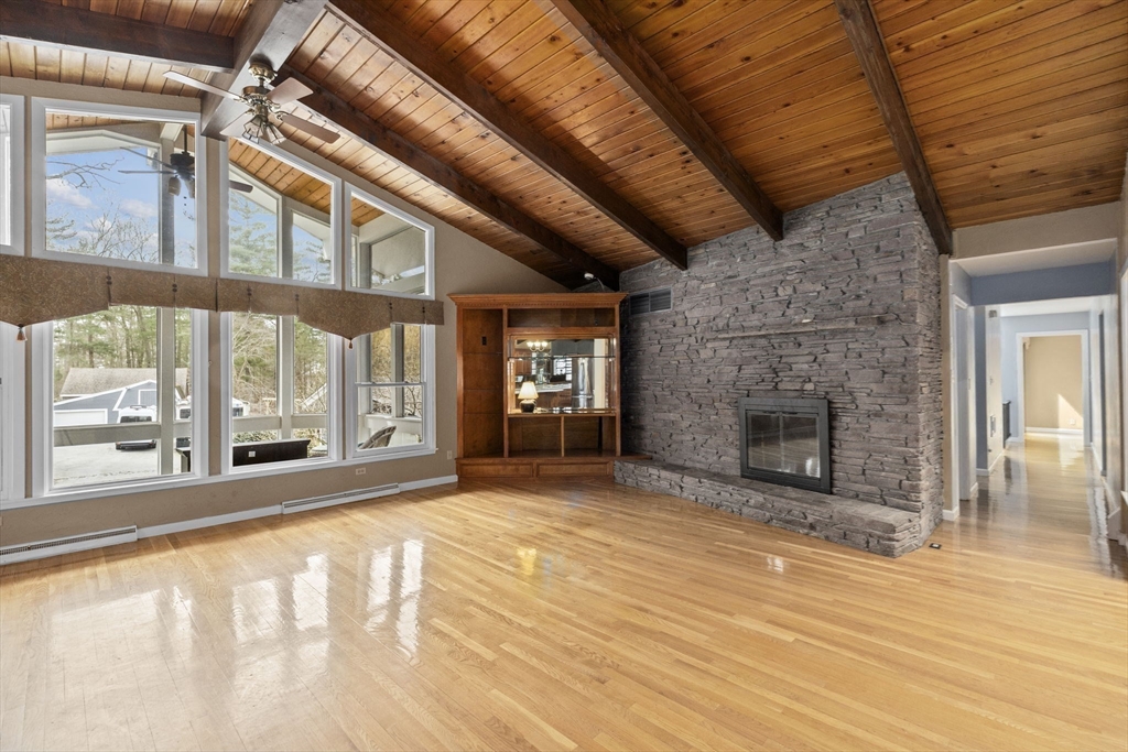 96 Deborah Road Hanover, MA 02339 - Photo 15 of 41 a view of an empty room with a fireplace and a window