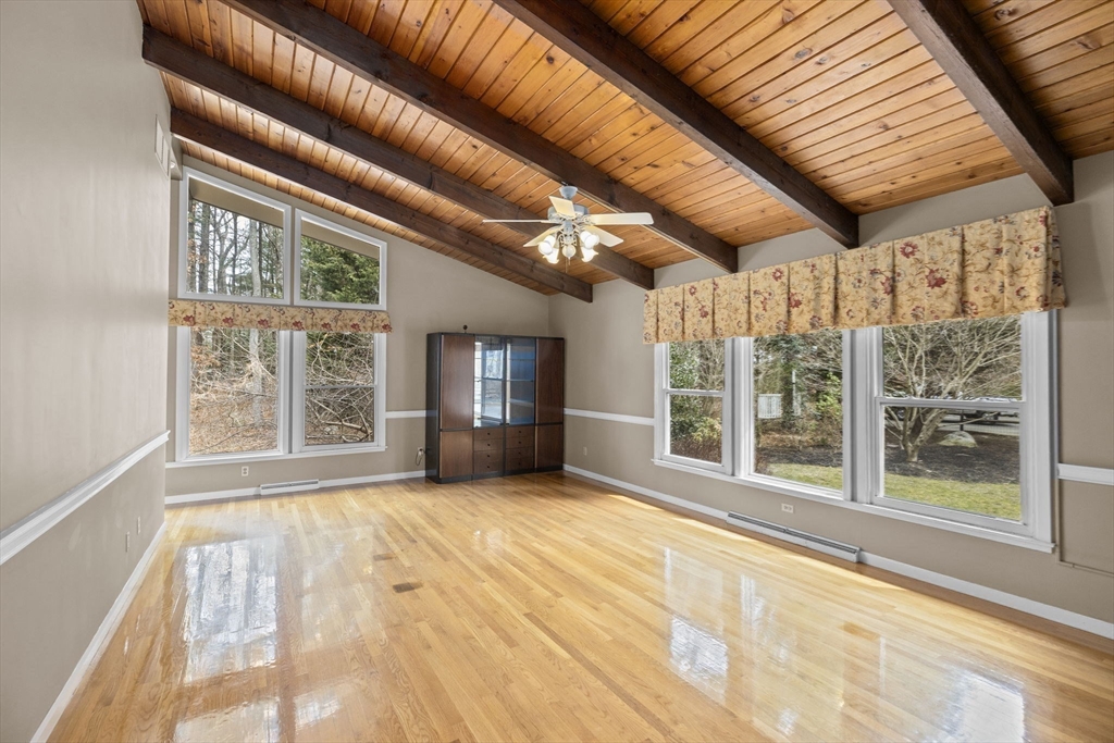 96 Deborah Road Hanover, MA 02339 - Photo 20 of 41 a view of empty room with wooden floor and fan