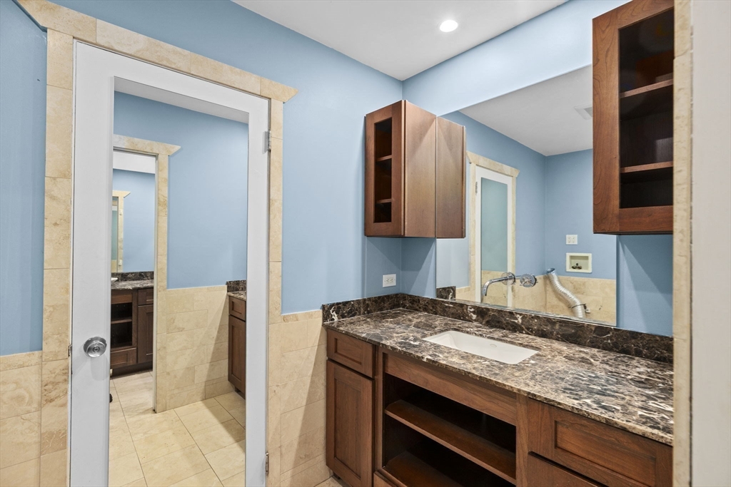 96 Deborah Road Hanover, MA 02339 - Photo 27 of 41 a kitchen with sink and cabinets
