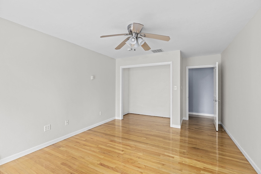 96 Deborah Road Hanover, MA 02339 - Photo 29 of 41 a view of an empty room and wooden floor