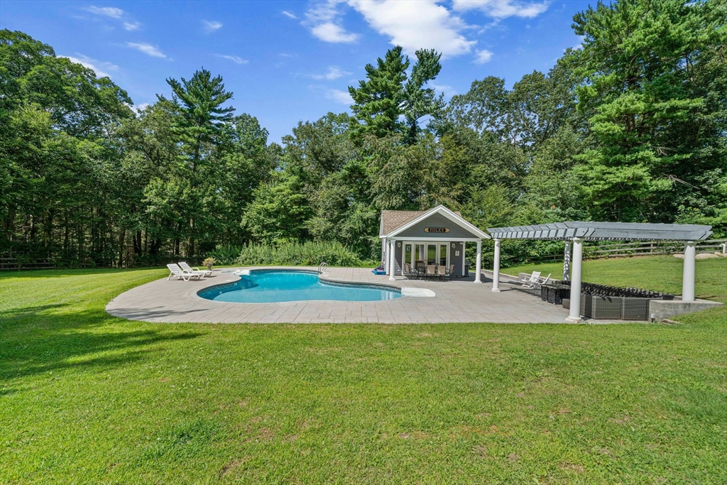 96 Deborah Road Hanover, MA 02339 - Photo 4 of 41 a view of a house with pool and a yard