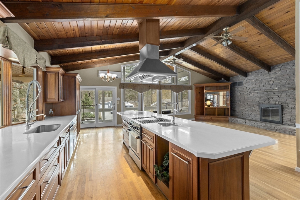 96 Deborah Road Hanover, MA 02339 - Photo 10 of 41 a large kitchen with kitchen island a large island in it