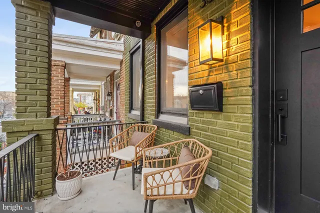 a view of balcony with furniture