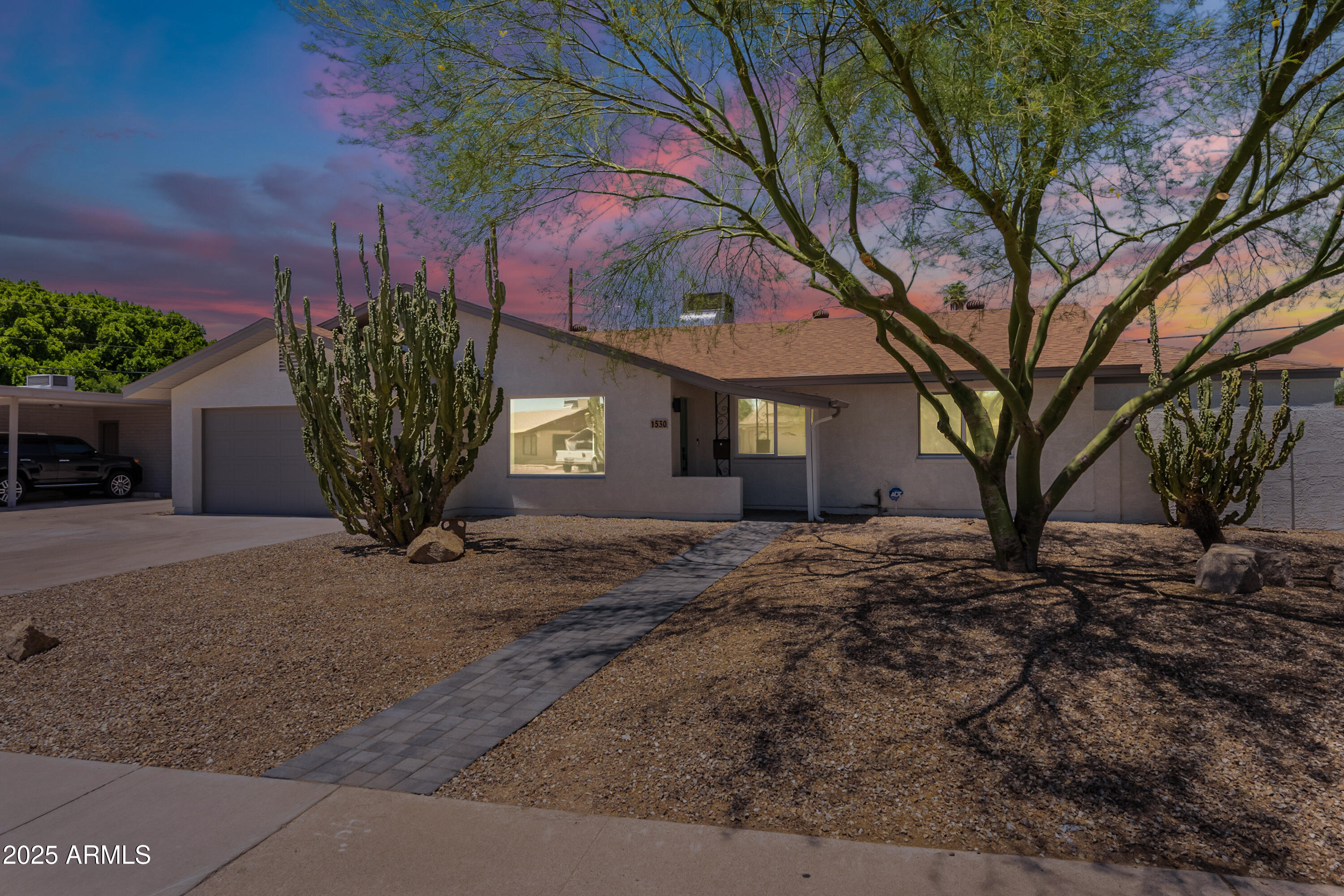 1530 East Alameda Drive Tempe, AZ 85282 - Photo 1 of 54 a view of a house with a yard and tree s