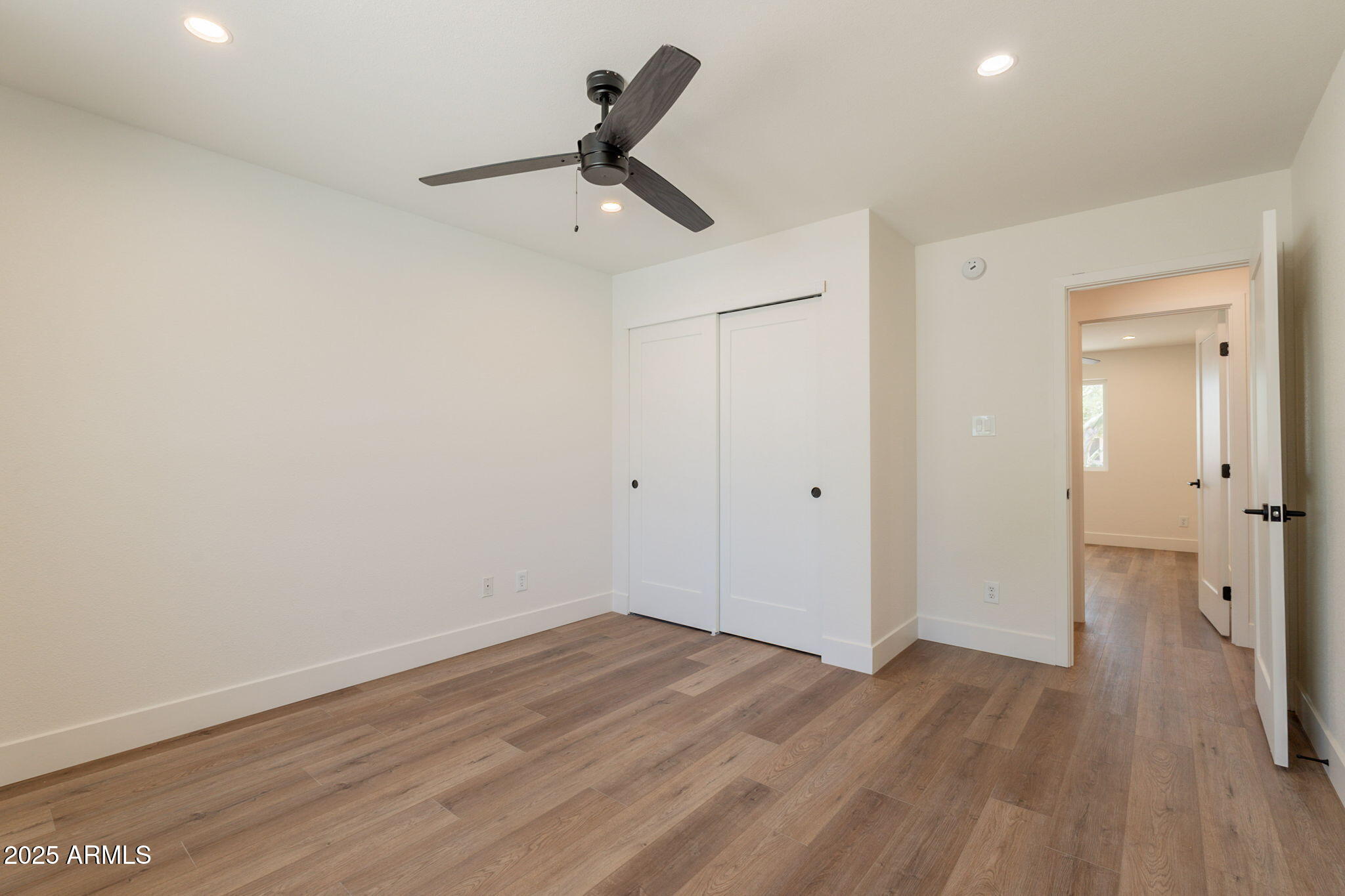 1530 East Alameda Drive Tempe, AZ 85282 - Photo 29 of 54 wooden floor in an empty room