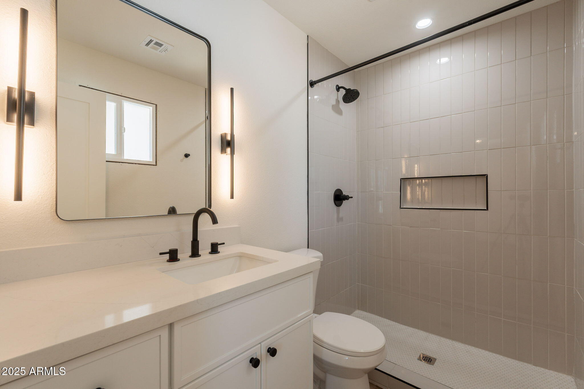 1530 East Alameda Drive Tempe, AZ 85282 - Photo 30 of 54 a bathroom with a sink a toilet and shower