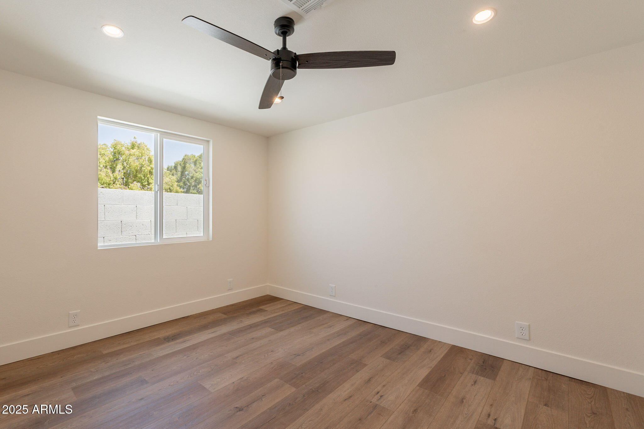 1530 East Alameda Drive Tempe, AZ 85282 - Photo 34 of 54 wooden floor in an empty room with a window