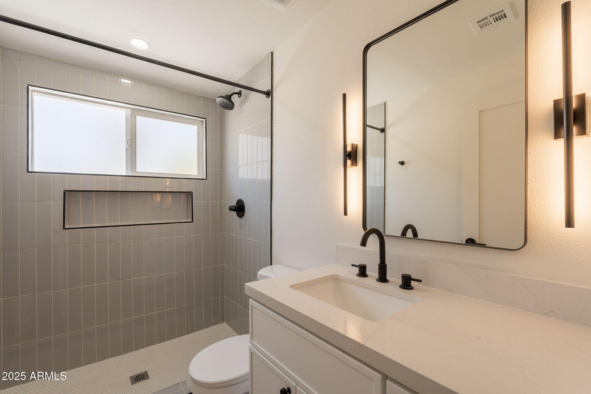 1530 East Alameda Drive Tempe, AZ 85282 - Photo 36 of 54 a bathroom with a sink toilet and shower