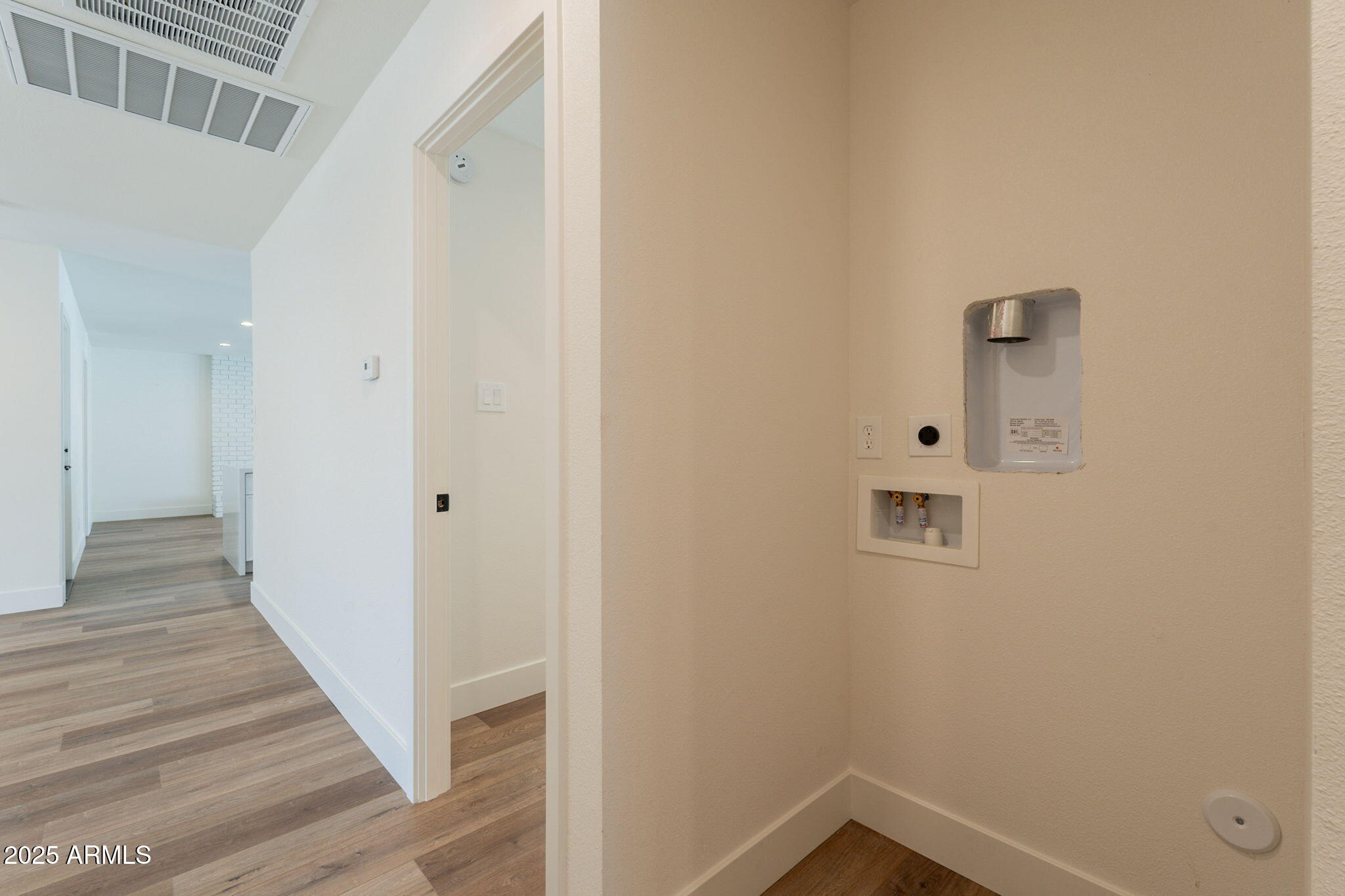 1530 East Alameda Drive Tempe, AZ 85282 - Photo 37 of 54 a view of a hallway with wooden floor