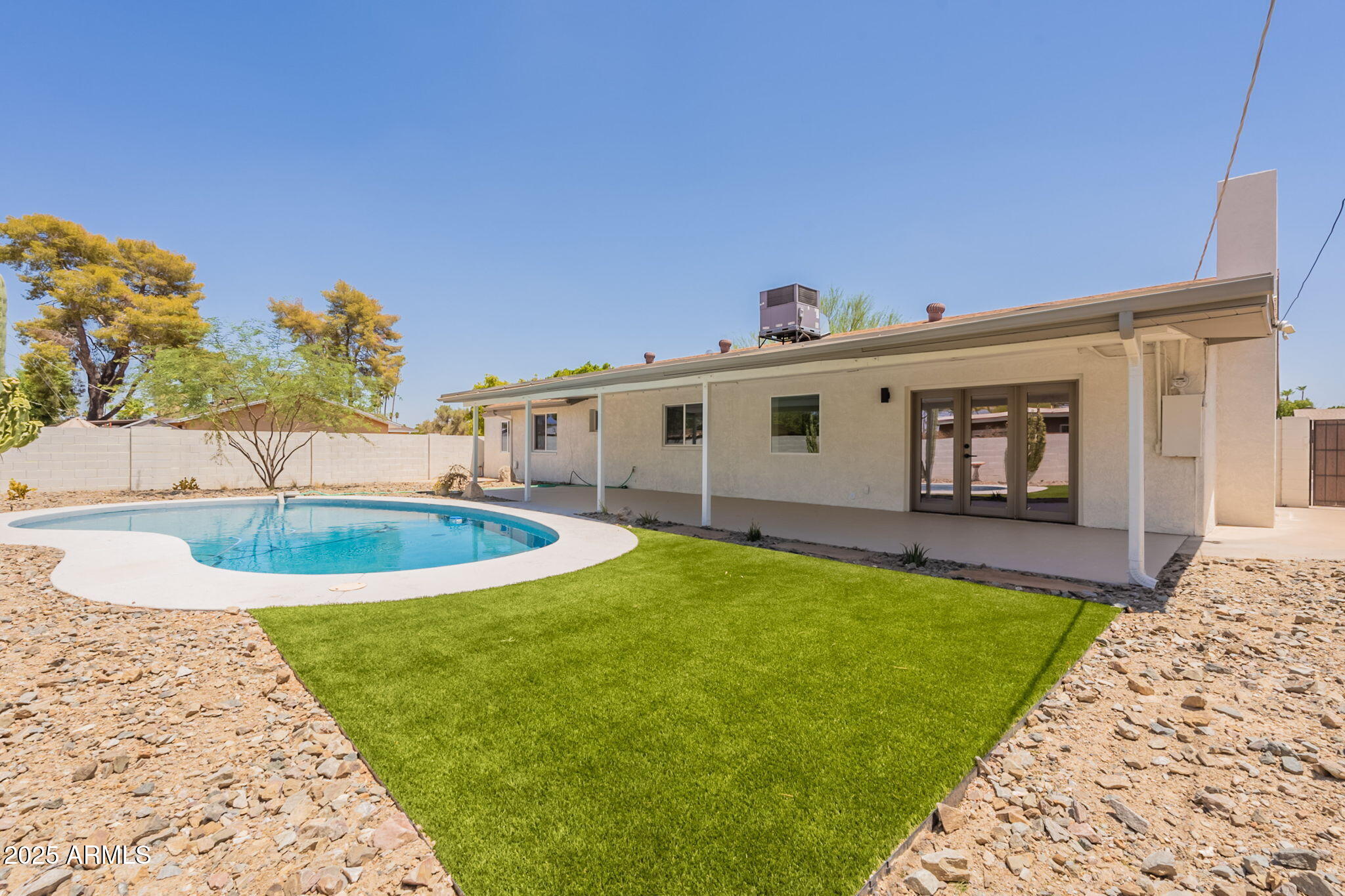 1530 East Alameda Drive Tempe, AZ 85282 - Photo 49 of 54 a view of a house with backyard and sitting area