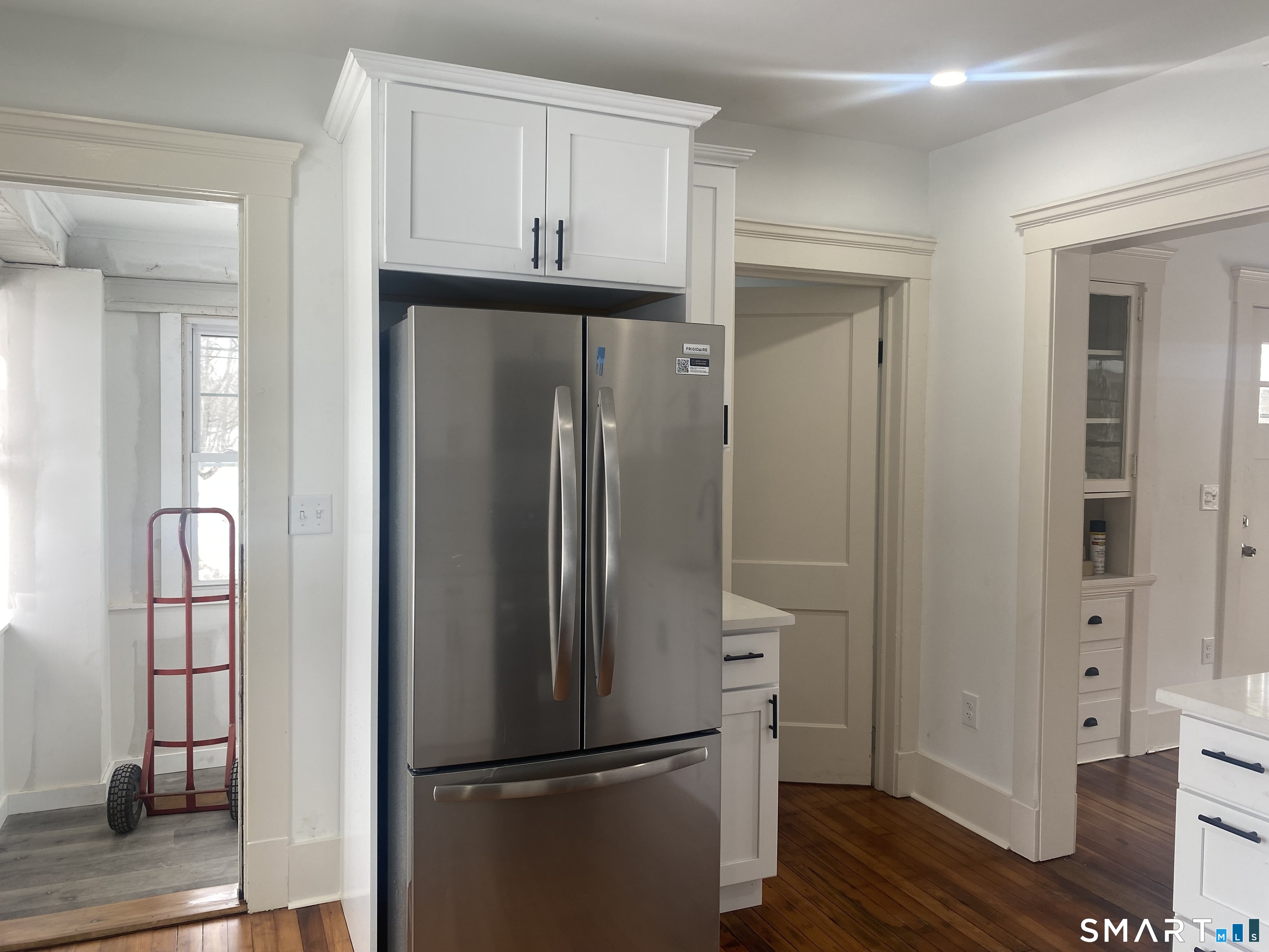 86 Foote Street Hamden, CT 06517 - Photo 2 of 14 a view of hallway with wooden floor