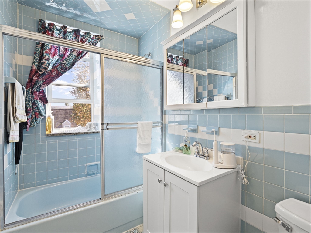 95 Florida Street, Unit 3 Boston, MA 02124 - Photo 19 of 29 a bathroom with a sink and a mirror