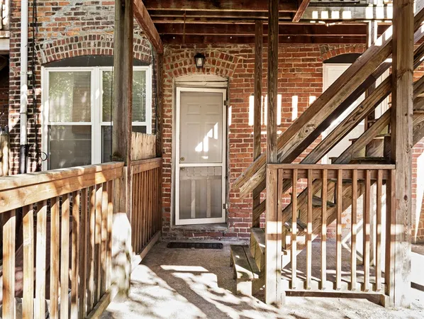 a view of entryway with a front door