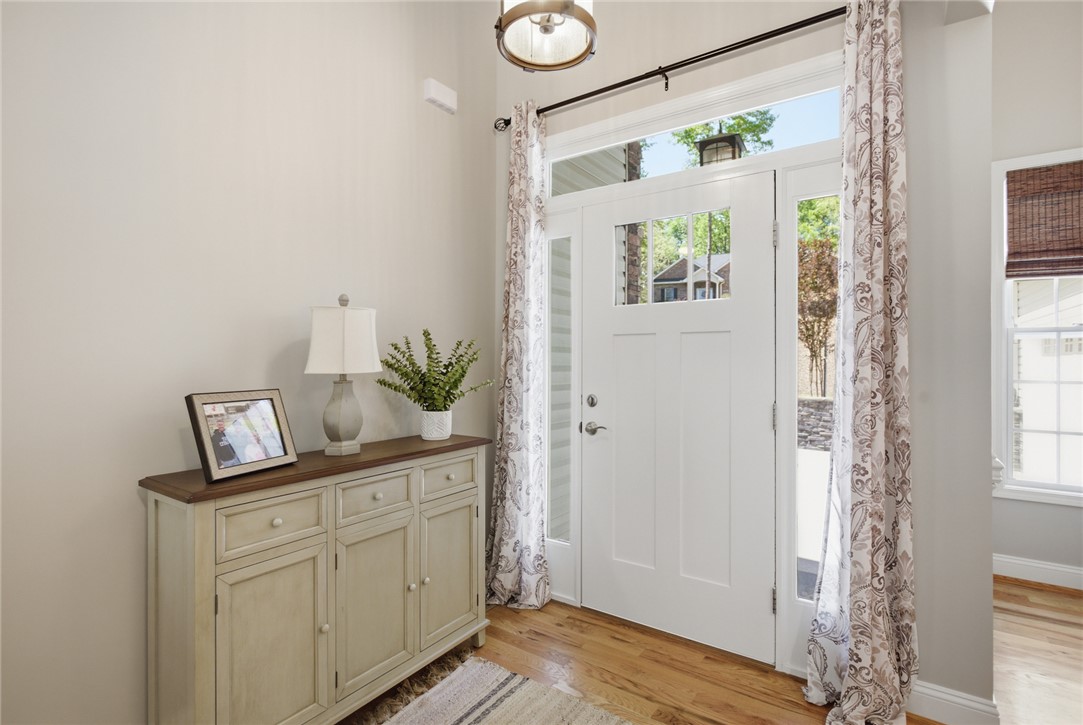 105 Winterbrook Circle Seneca, SC 29678 - Photo 3 of 48 This bright entrance welcomes you home with natural light and classic hardwood floors.