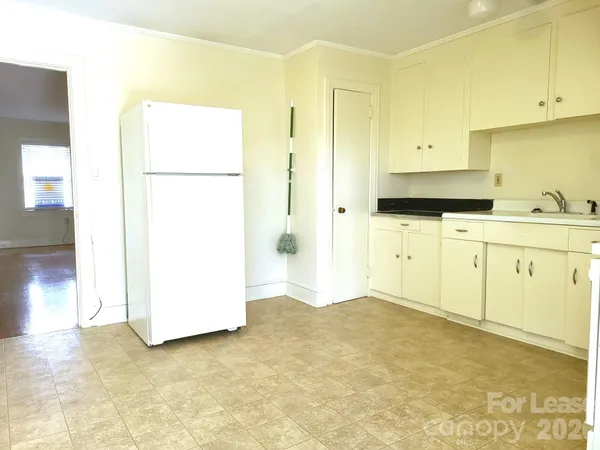 a view of kitchen and utility room