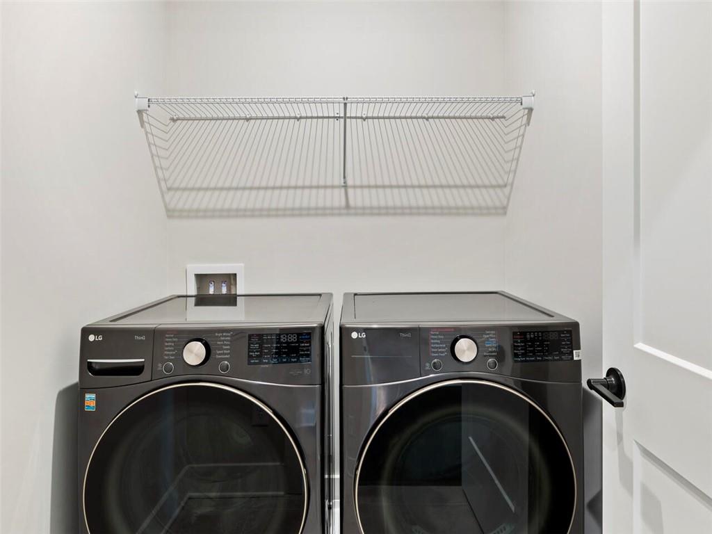 355 Chiswick Circle Alpharetta, GA 30009 - Photo 33 of 57 a utility room with dryer and washer