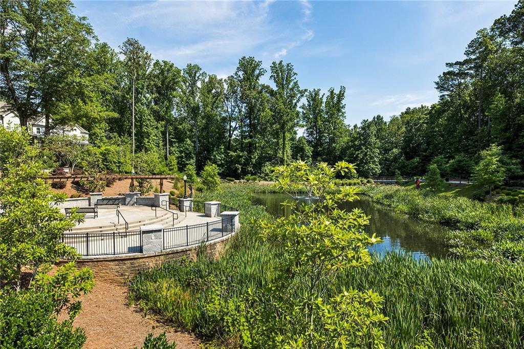 355 Chiswick Circle Alpharetta, GA 30009 - Photo 37 of 57 a view of a house with a yard and sitting area