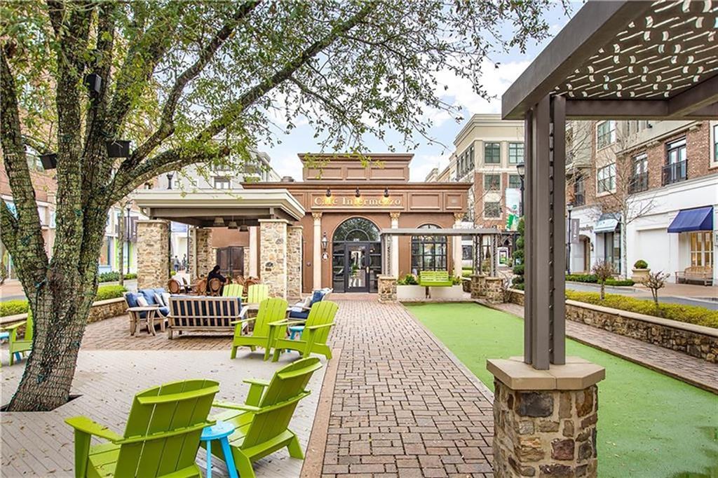 355 Chiswick Circle Alpharetta, GA 30009 - Photo 41 of 57 a front view of a building with outdoor seating