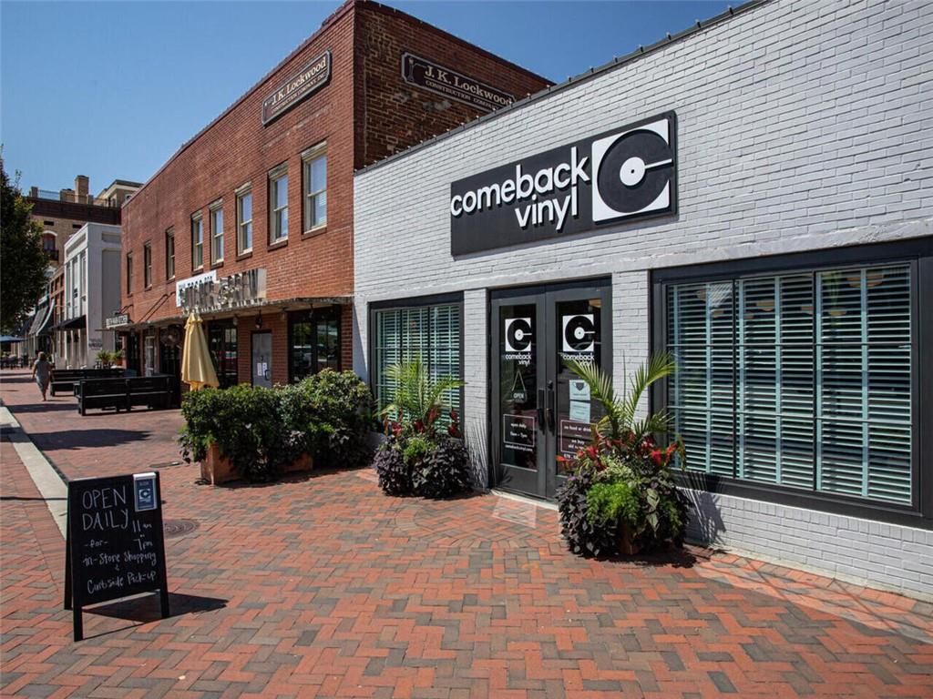 355 Chiswick Circle Alpharetta, GA 30009 - Photo 53 of 57 a view of a building with potted plants