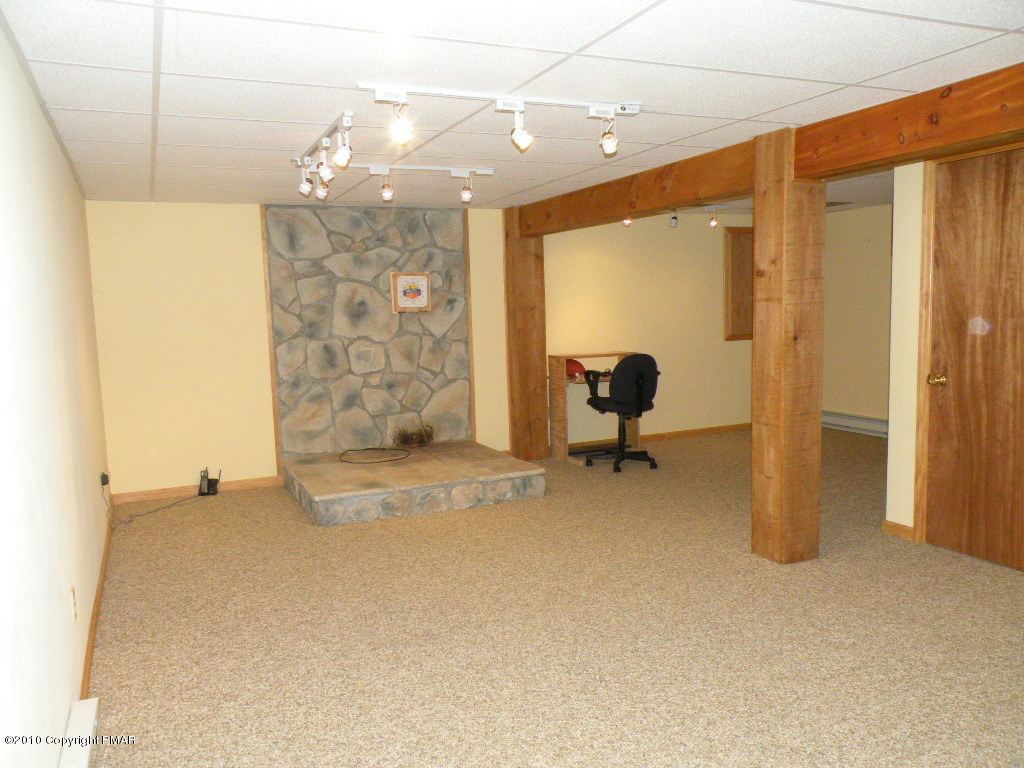 1008 Sawmill Road Pocono Lake, PA 18347 - Photo 12 of 16 Family room side