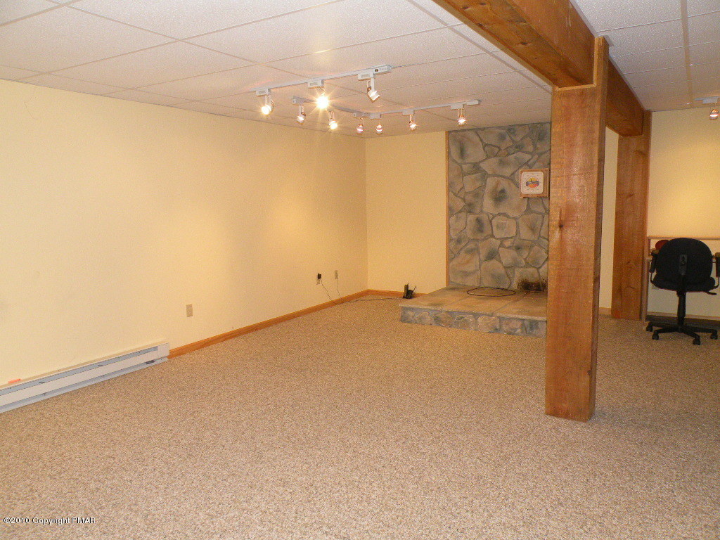 1008 Sawmill Road Pocono Lake, PA 18347 - Photo 13 of 16 family room view