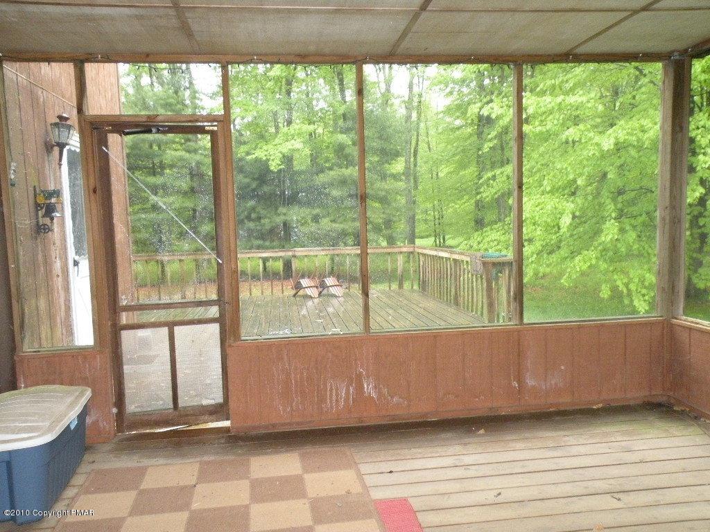 1008 Sawmill Road Pocono Lake, PA 18347 - Photo 15 of 16 Screen porch
