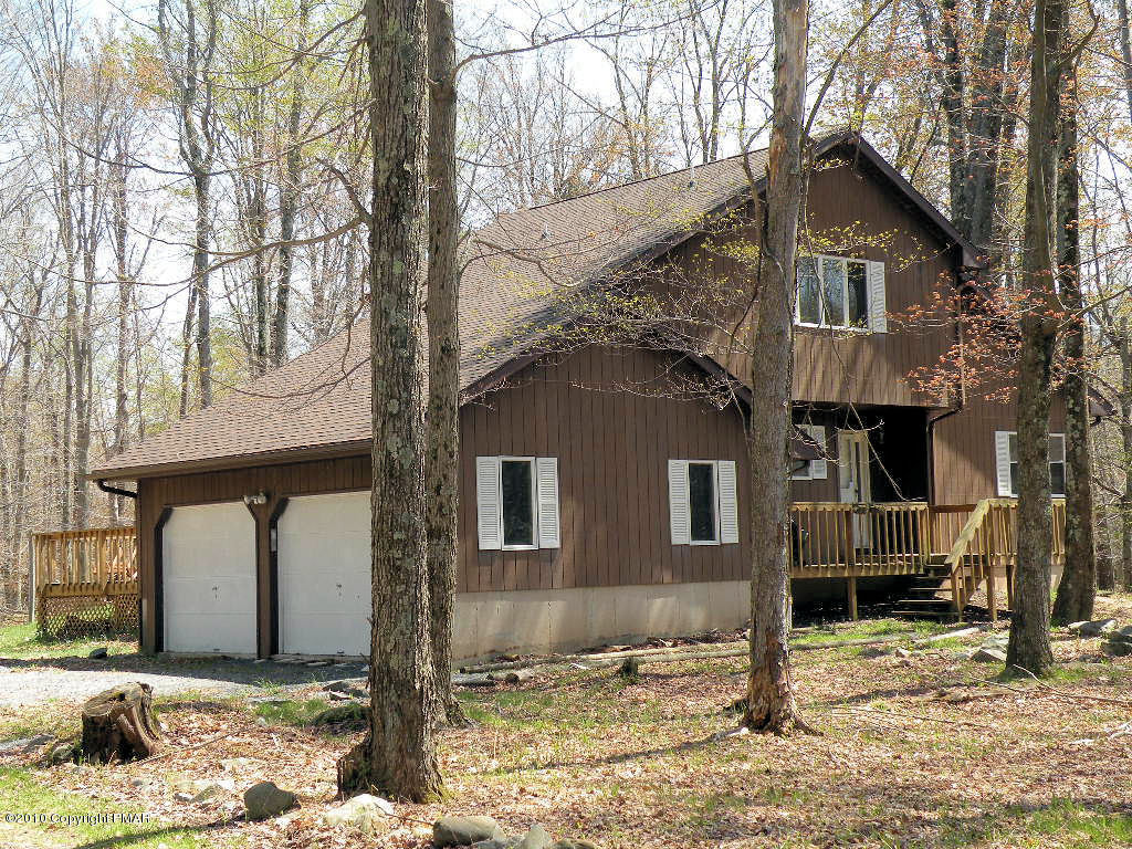 1008 Sawmill Road Pocono Lake, PA 18347 - Photo 2 of 16 Exterior - side garage