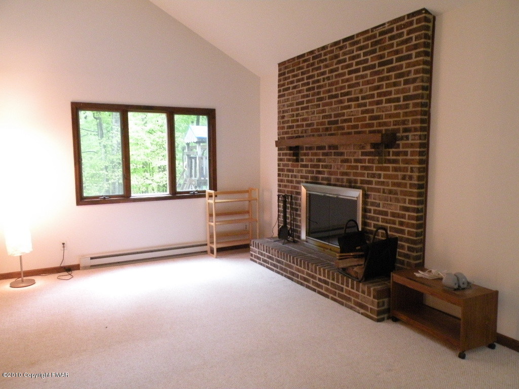 1008 Sawmill Road Pocono Lake, PA 18347 - Photo 5 of 16 Living room side