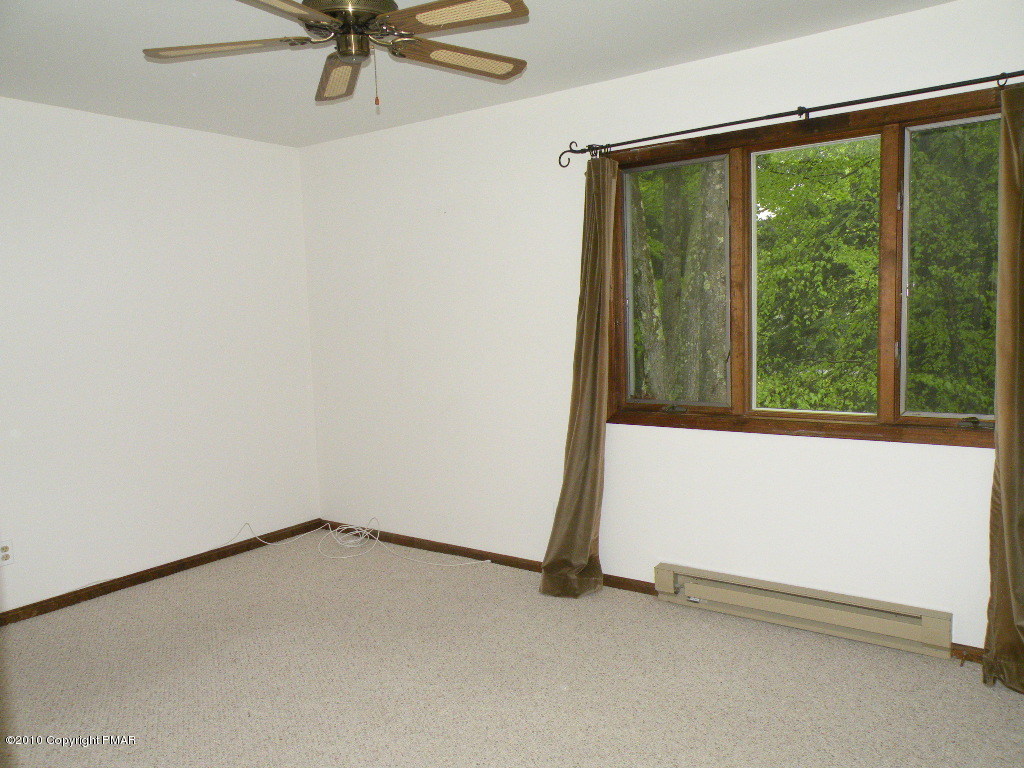 1008 Sawmill Road Pocono Lake, PA 18347 - Photo 8 of 16 Master bedroom