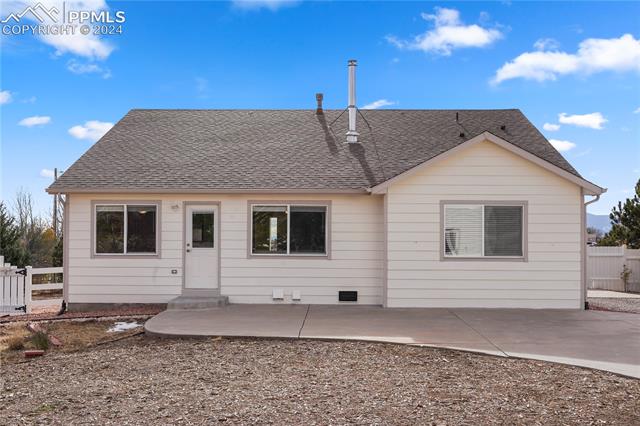 8271 Del Rio Road Peyton, CO 80831 - Photo 27 of 34 Huge back patio perfect for entertaining