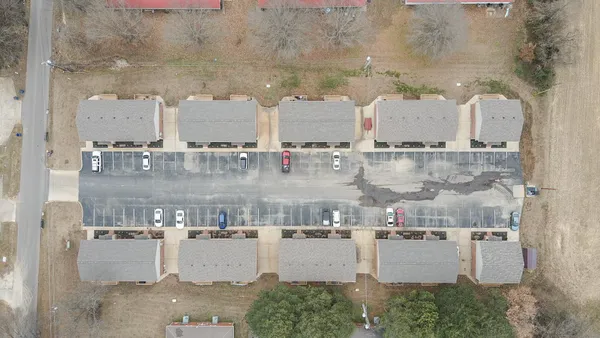 a view of a street with cars